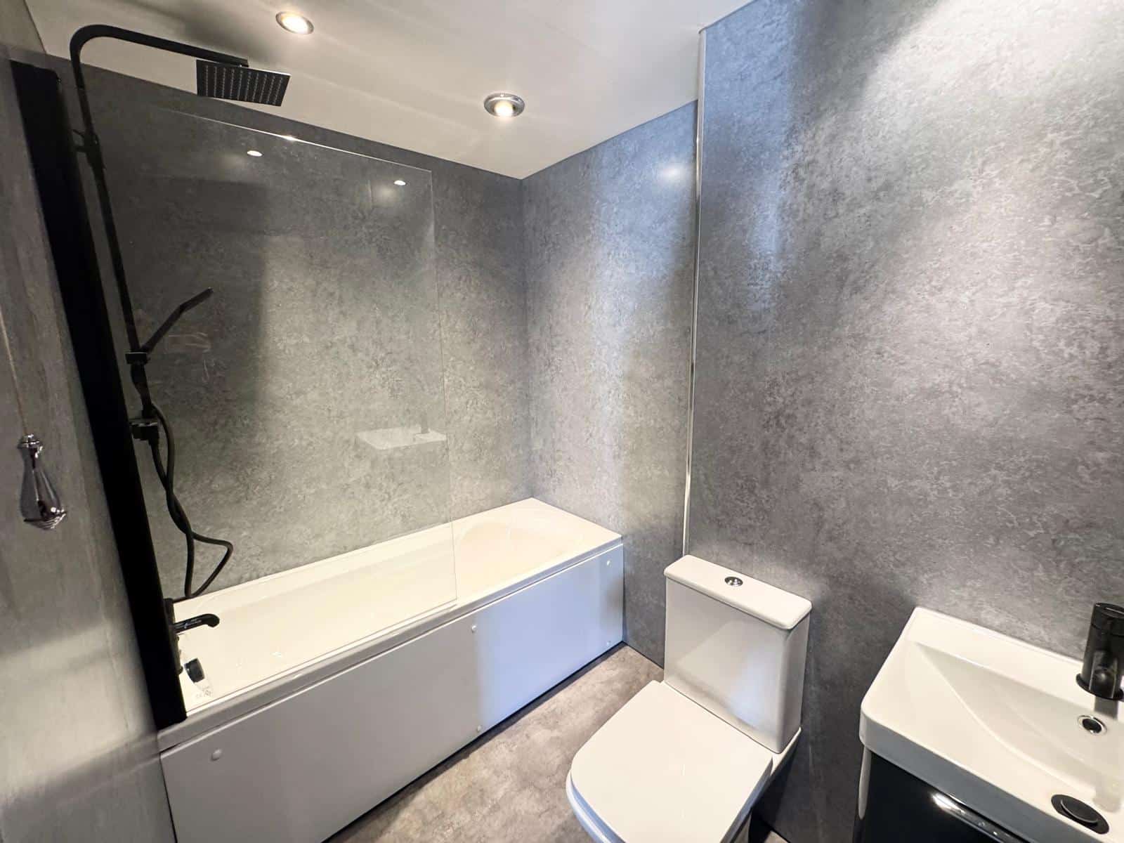Modern, grey, sleek bathroom/shower room