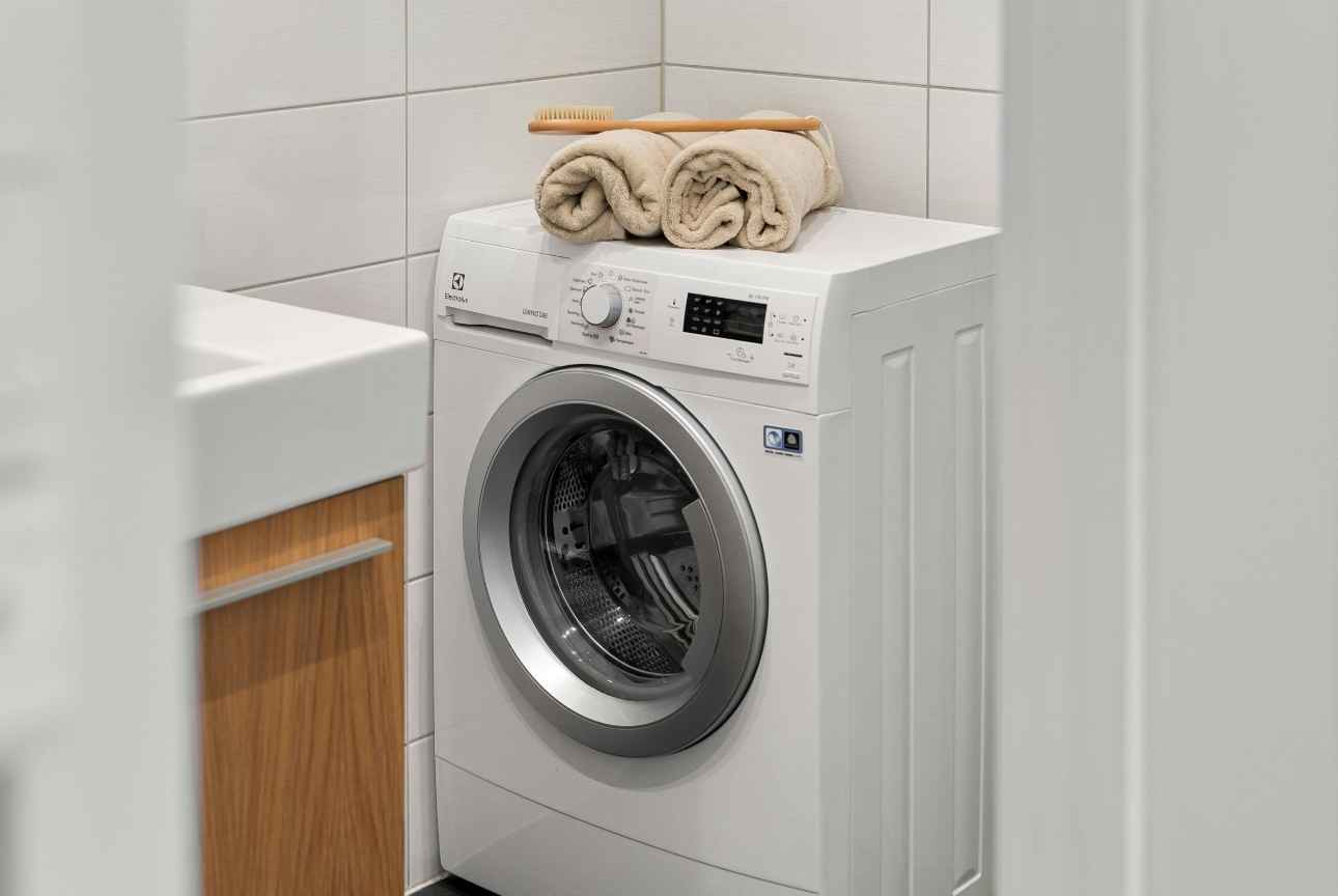 washing machine in sleek utility room